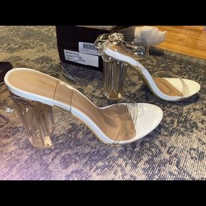 Clear heels, never worn.